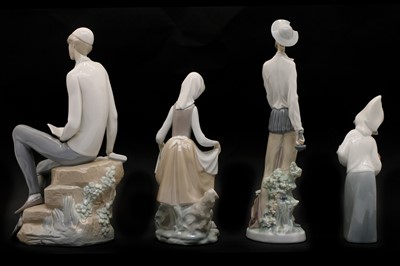 Lot 215 - A group of four Lladro figures