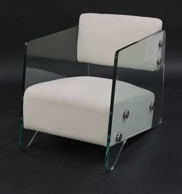 Lot 703 - A contemporary glass armchair