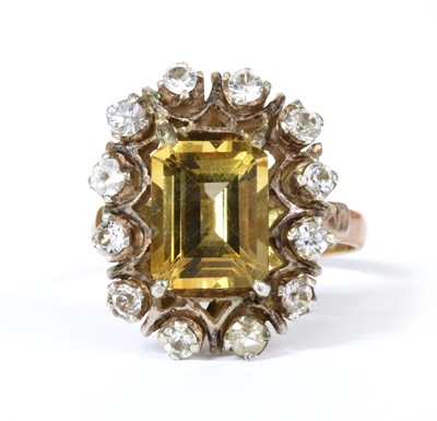 Lot 143 - A gold and silver, citrine and synthetic spinel cluster ring