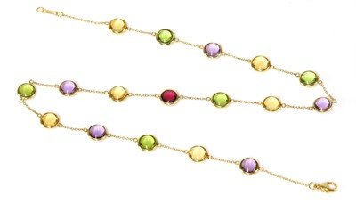 Lot 490 - An 18ct gold 'Dot Station' gem set necklace by Tiffany & Co.