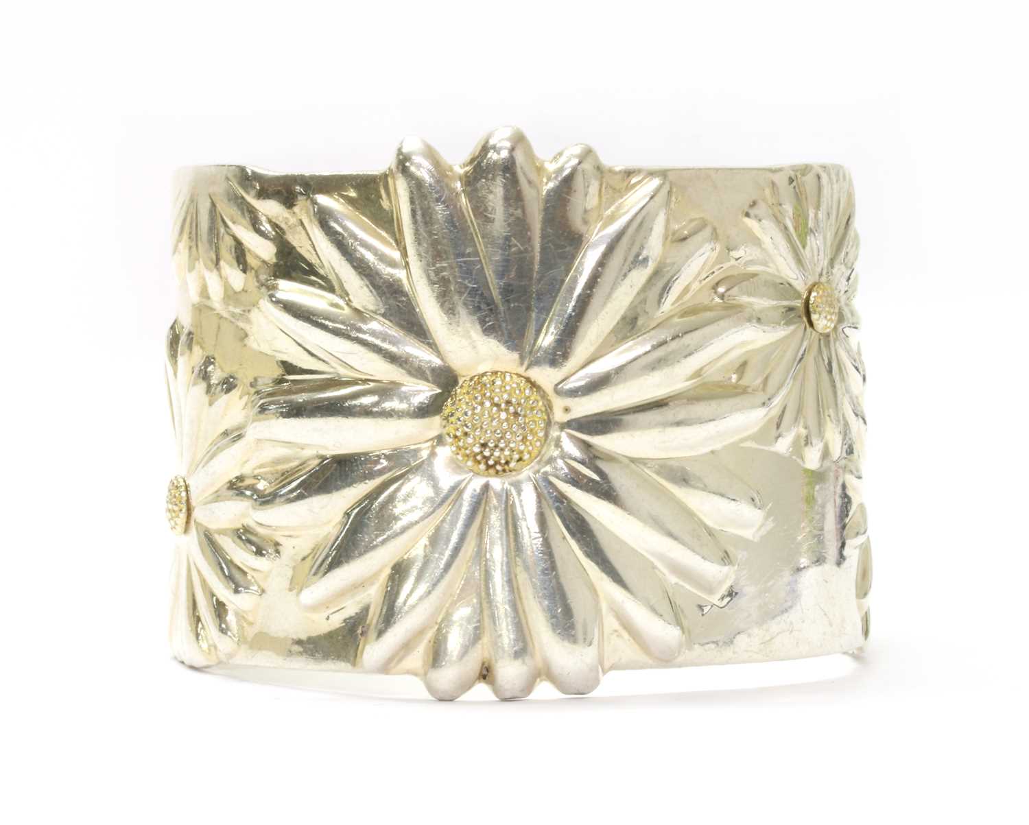 Lot 39 - A silver daisy torque cuff bangle, by Tiffany & Co.