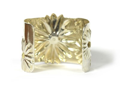 Lot 39 - A silver daisy torque cuff bangle, by Tiffany & Co.