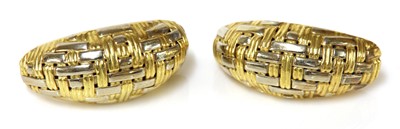 Lot 399 - A pair of yellow and white gold basket weave tapered half hoop style earrings