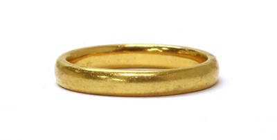 Lot 114 - A 22ct gold court section wedding ring