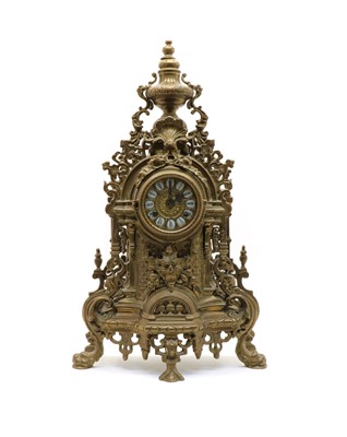 Lot 123 - A Louis XV revival brass cased mantel clock