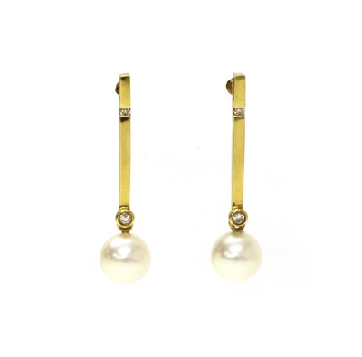 Lot 1254 - A pair of 18ct gold cultured pearl and diamond drop earrings