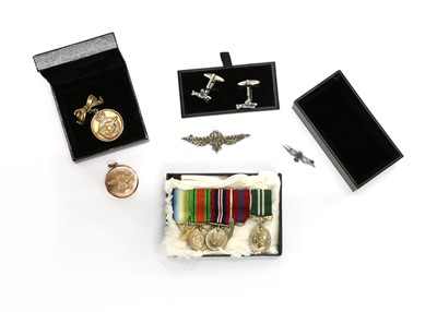 Lot 54 - A 9ct gold circular Royal Naval Air Service (RNAS) locket