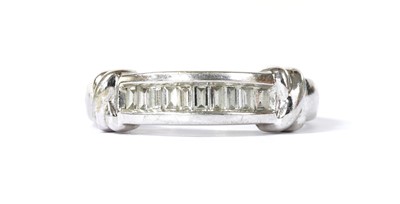 Lot 165 - A 9ct white gold diamond half eternity ring