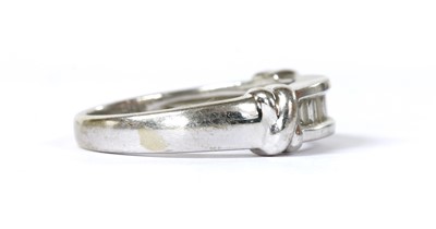 Lot 165 - A 9ct white gold diamond half eternity ring