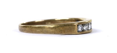 Lot 139 - A 9ct gold half eternity ring
