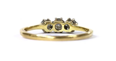 Lot 99 - A gold three stone diamond ring