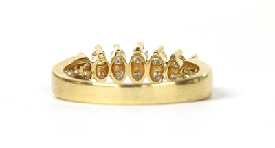Lot 57 - An 18ct gold two row diamond ring