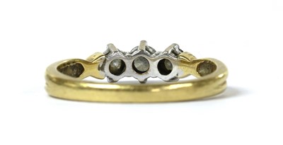 Lot 55 - An 18ct gold three stone diamond ring
