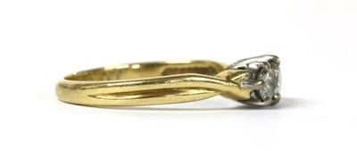 Lot 55 - An 18ct gold three stone diamond ring