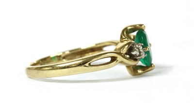 Lot 156 - A 9ct gold emerald and diamond ring