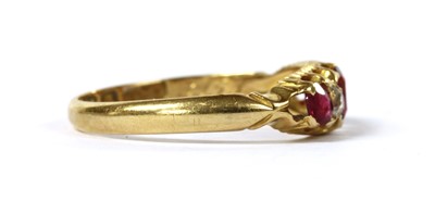 Lot 11 - An 18ct gold ruby and diamond five stone ring