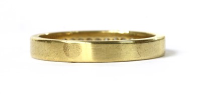 Lot 109 - A gold diamond band ring