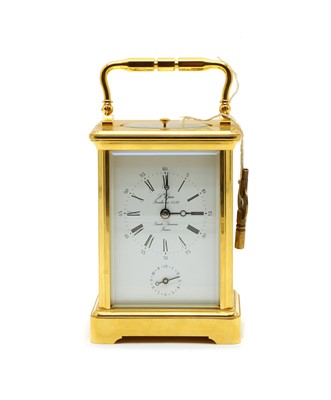 Lot 143 - A lacquered brass carriage clock