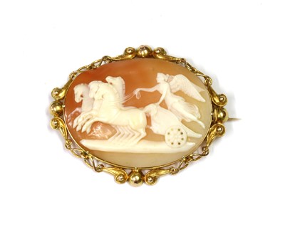 Lot 27 - A gold mounted Victorian shell cameo brooch