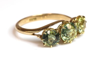 Lot 91 - An Edwardian three stone sapphire ring
