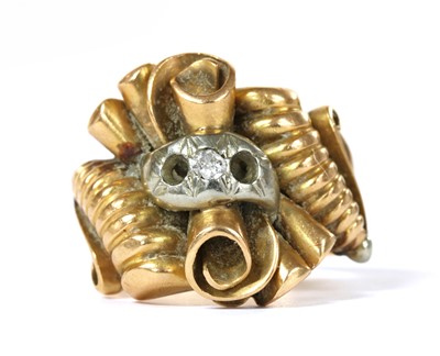 Lot 378 - A gold diamond set scroll ring