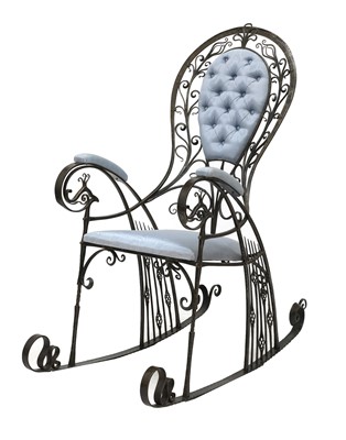 Lot 637 - The 'Peacock' iron rocking chair