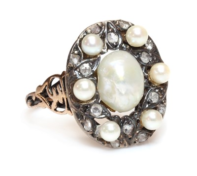 Lot 314 - An oriental cultured freshwater pearl, cultured pearl and diamond oval cluster ring