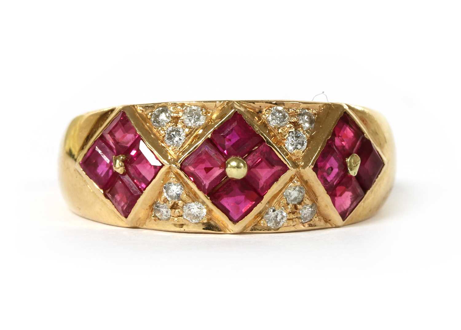 Lot 1154 - A gold ruby and diamond ring