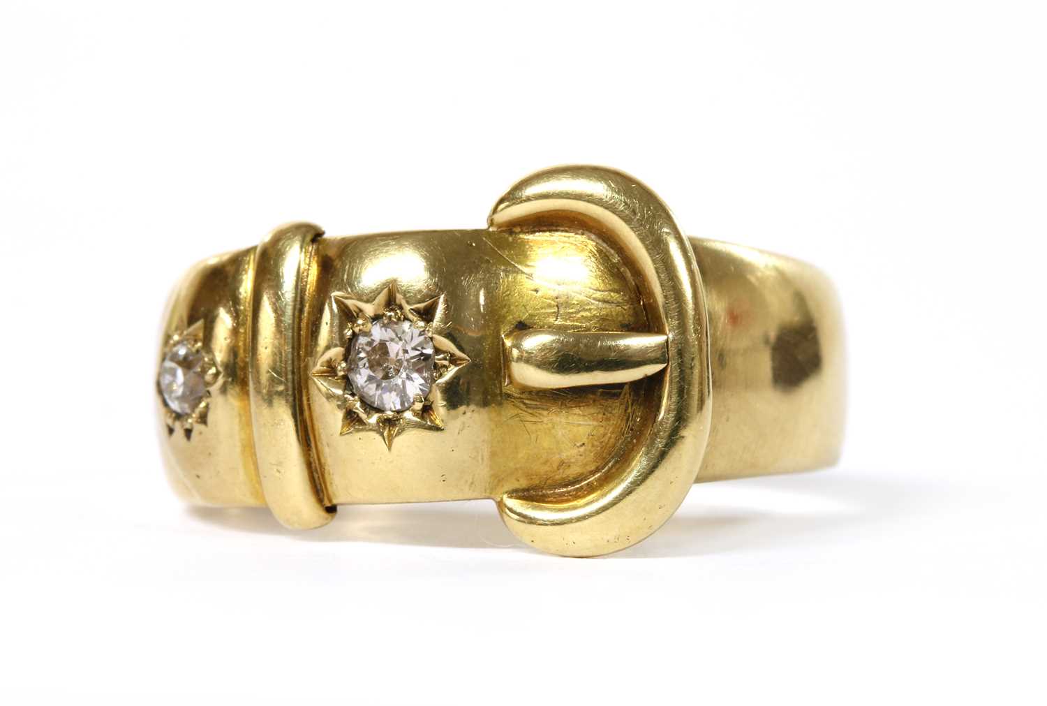 Lot 1002 - A Victorian 18ct gold diamond set buckle ring