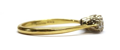 Lot 98 - An 18ct gold three stone diamond ring