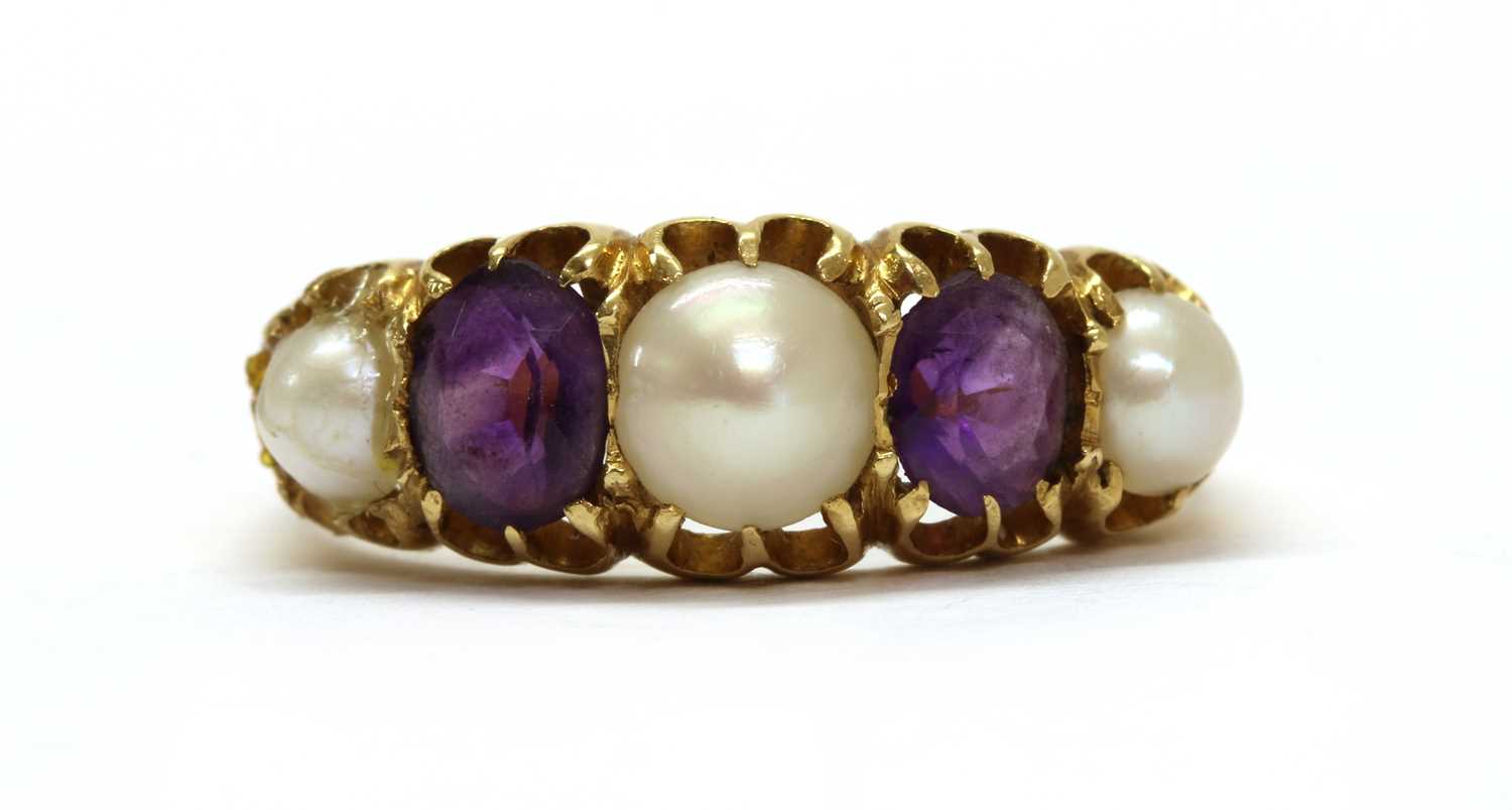 Lot 12 - A gold split pearl and amethyst five stone ring