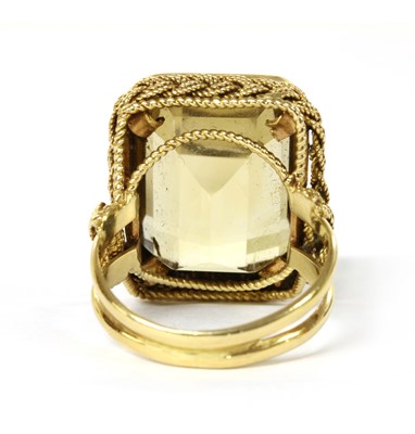 Lot 1177 - A gold single stone citrine ring