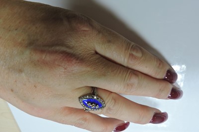 Lot 26 - A Georgian diamond and enamel navette shaped ring