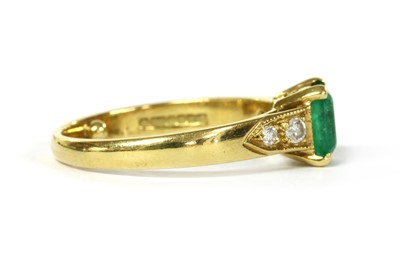 Lot 1192 - An 18ct gold emerald and diamond ring
