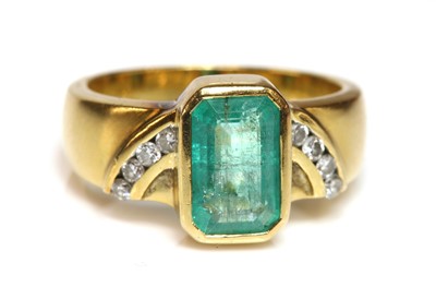 Lot 474 - A gold emerald and diamond ring