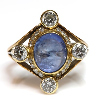 Lot 336 - An 18ct gold sapphire and diamond ring