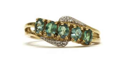 Lot 260 - A 9ct gold gemstone and diamond set ring