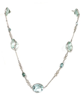 Lot 1241 - A silver blue zircon and paste set necklace