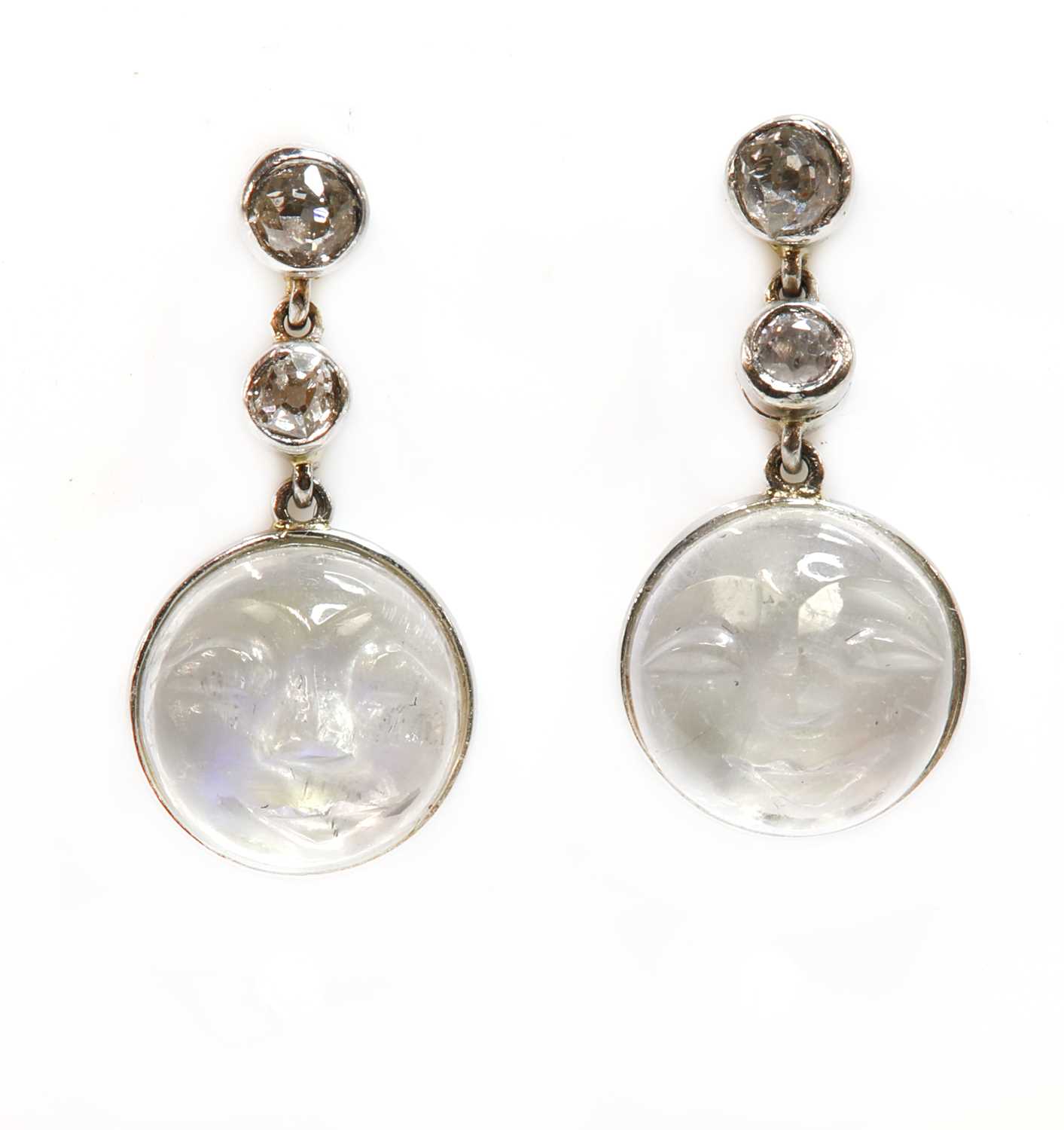 Lot 176 - A pair of moonstone and diamond 'man in the moon' drop earrings
