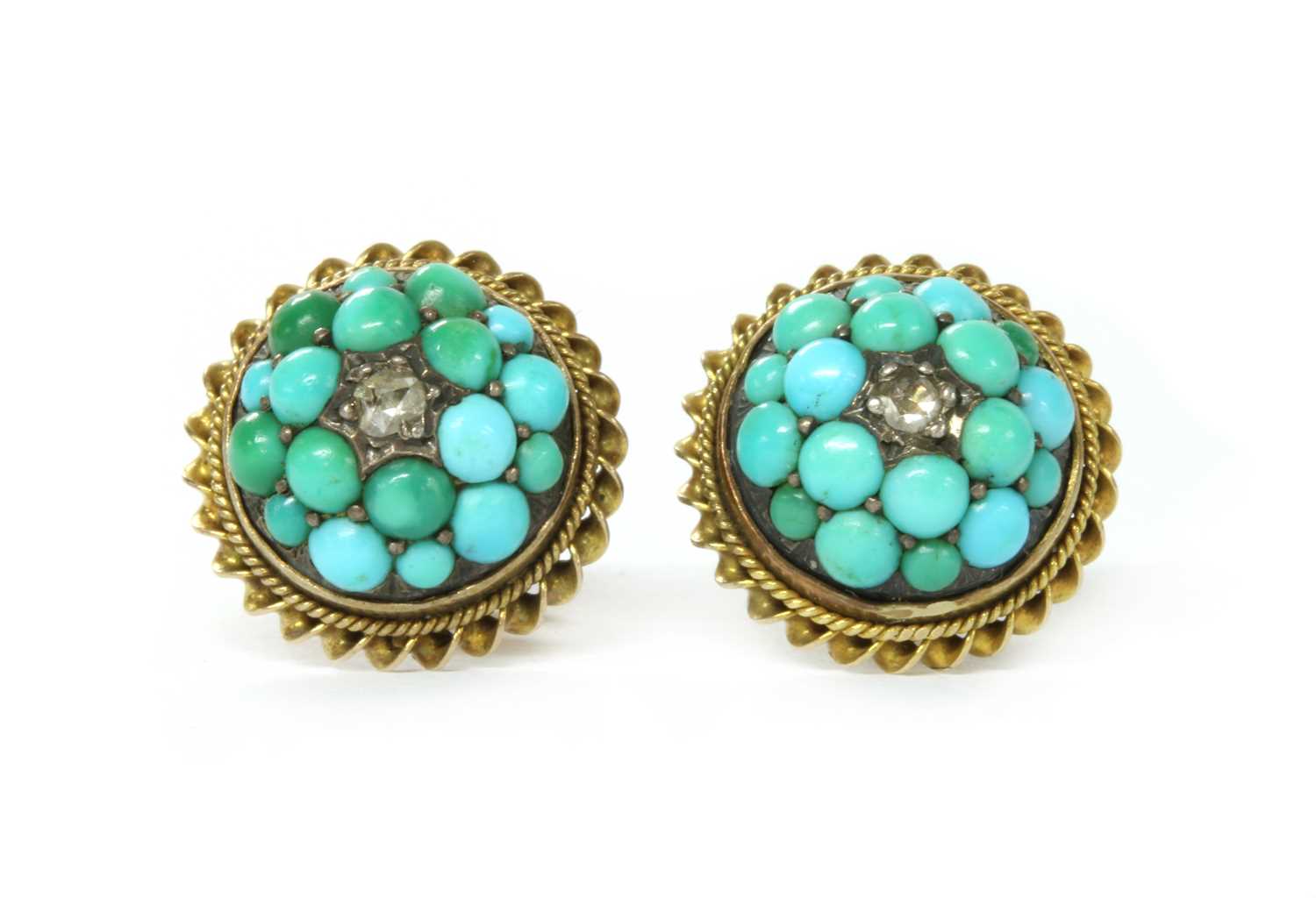 Lot 1016 - A pair of gold and silver, diamond and turquoise bombé clusters