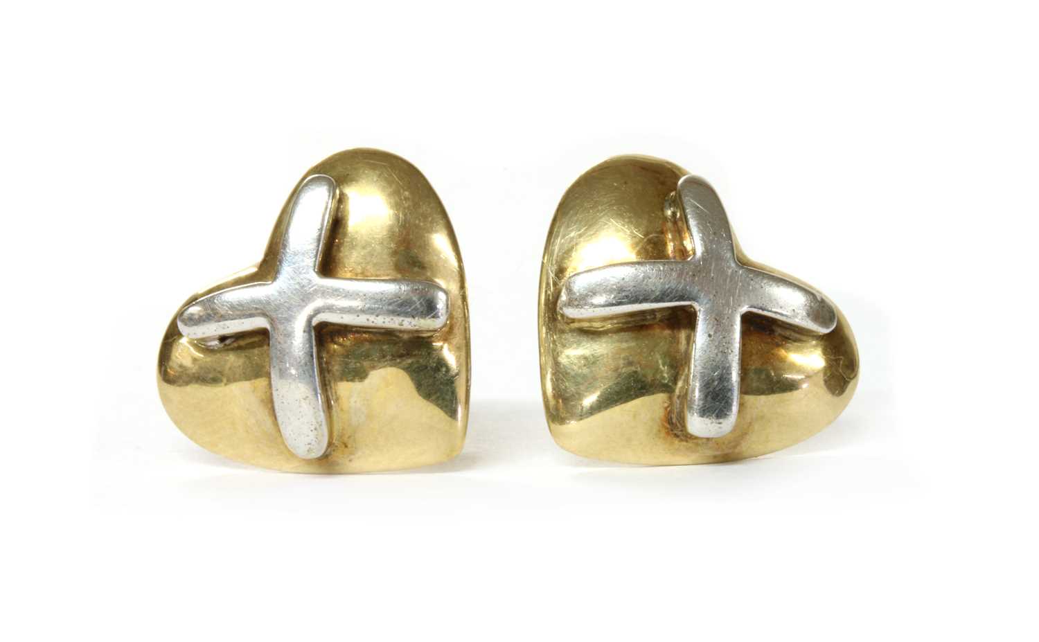 Lot 1110 - A pair of 9ct two colour gold stud earrings