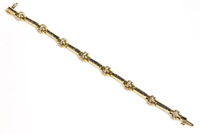 Lot 455 - An Austrian gold sapphire and diamond bracelet
