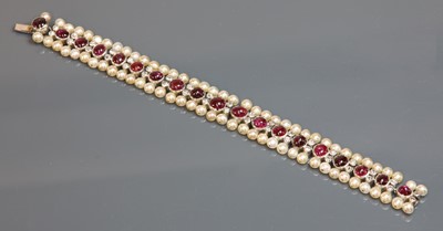 Lot 145 - A ruby, diamond and pearl bracelet