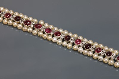 Lot 145 - A ruby, diamond and pearl bracelet