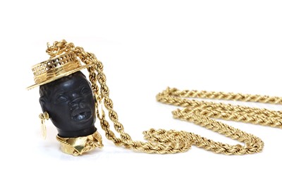 Lot 277 - An 18ct gold blackamoor pendant, c.1950