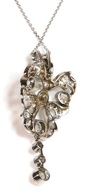 Lot 82 - An early 20th century pearl and diamond cartouche shaped pendant