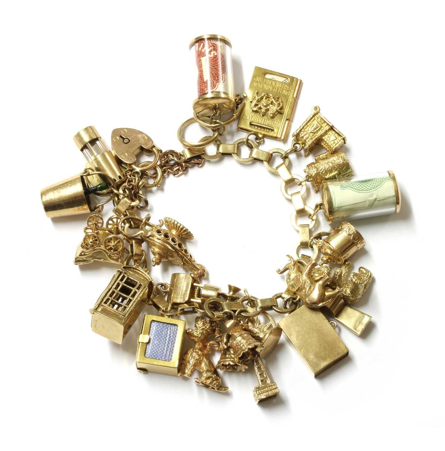 Lot 109 - A gold charm bracelet