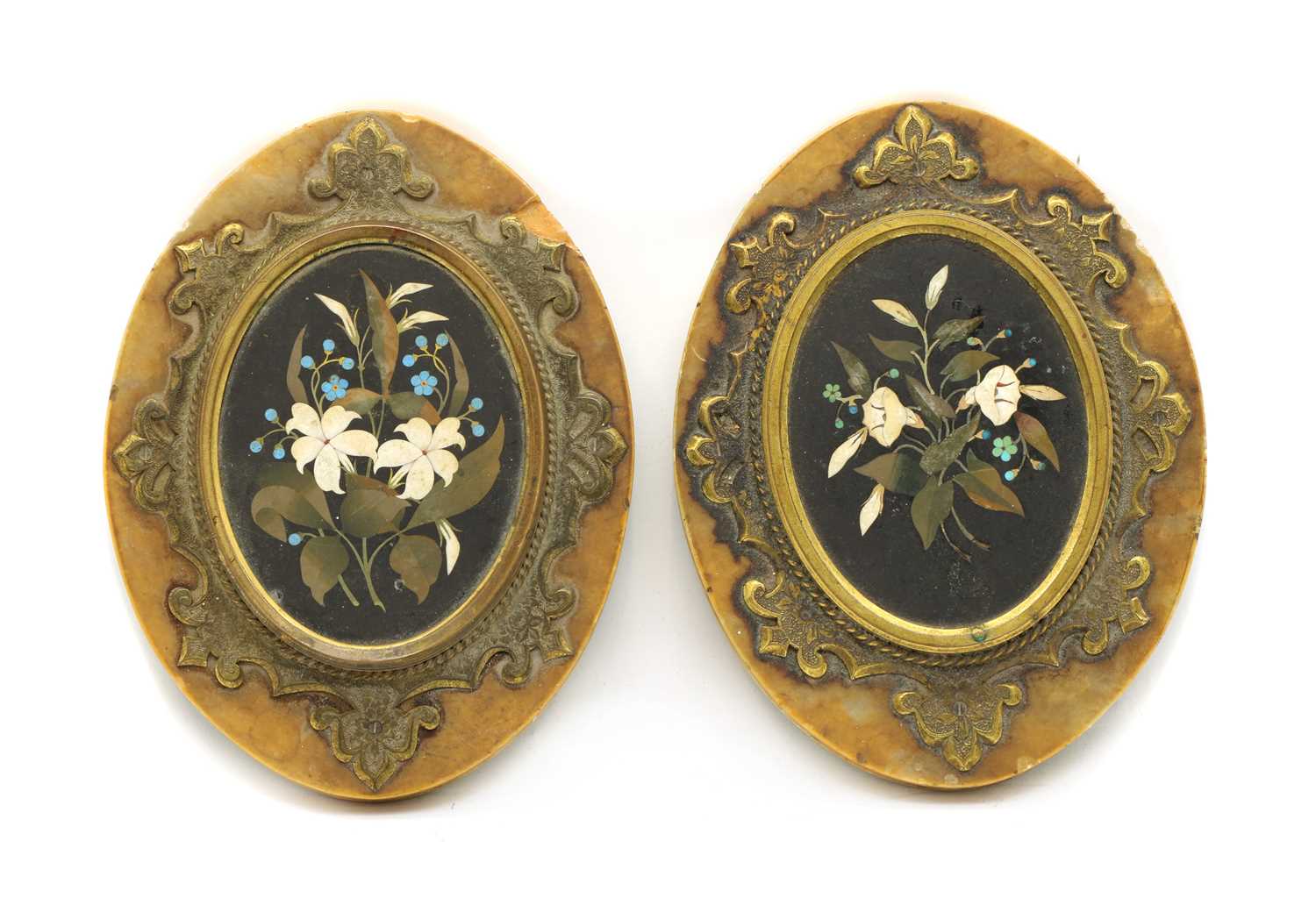 Lot 115 - A pair of pietra dura oval panels