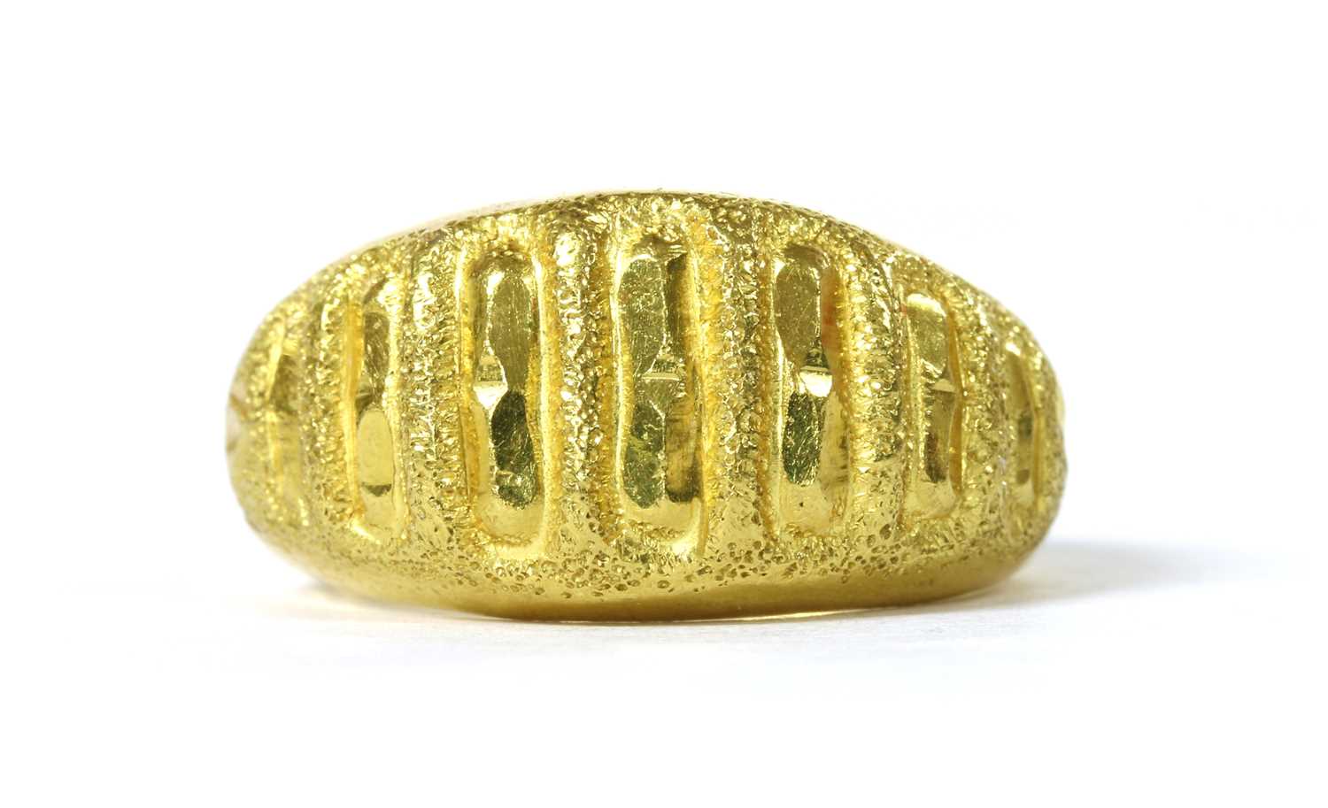 Lot 439 - A gold hollow domed ring