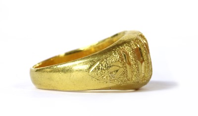 Lot 439 - A gold hollow domed ring